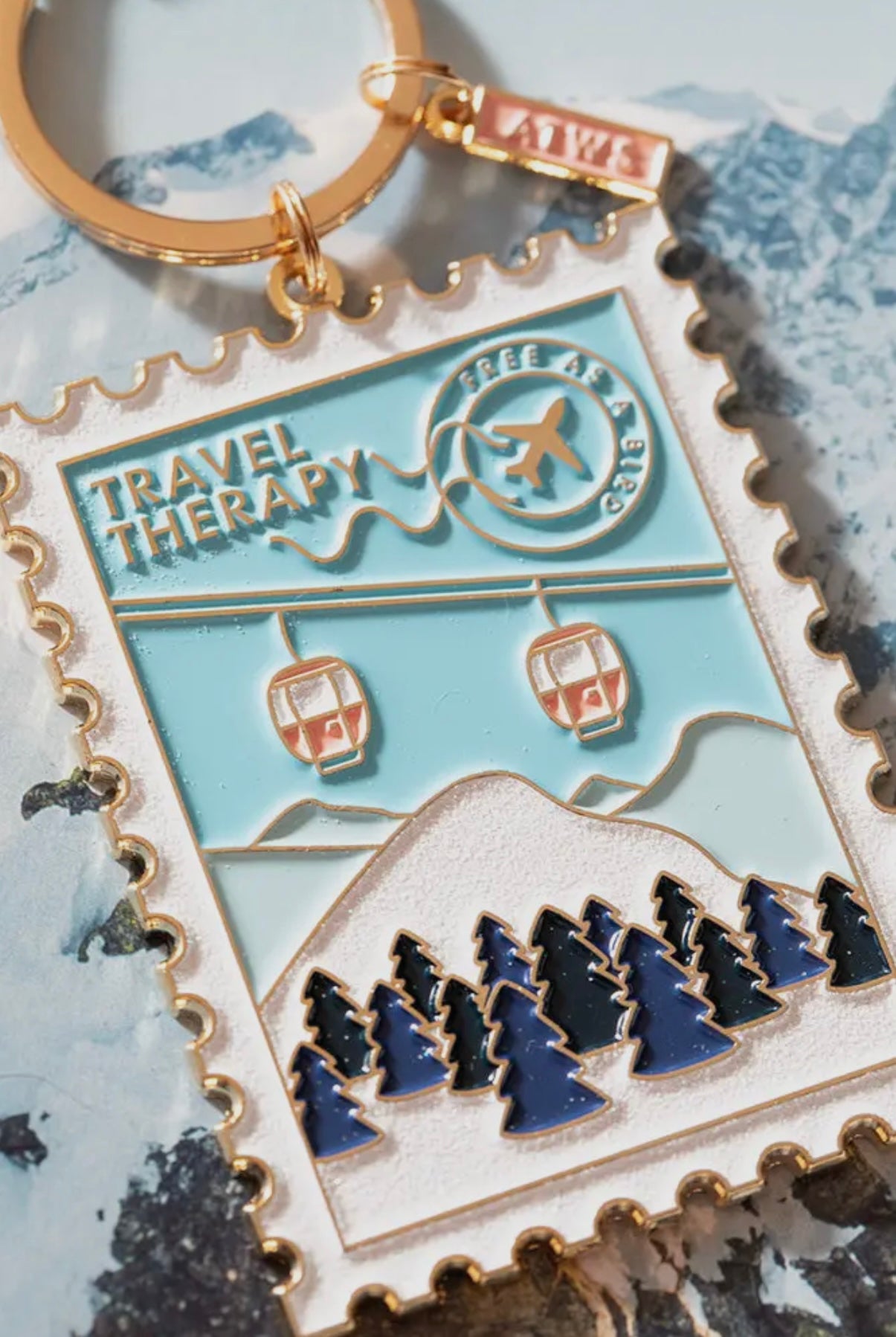 Porte-clés “Travel Therapy” – Émail et Plaqué Or FOBstory