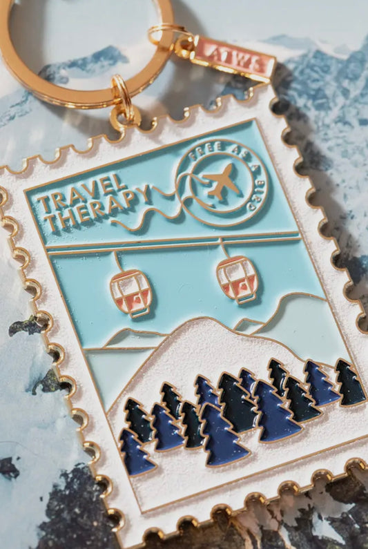 Porte-clés “Travel Therapy” – Émail et Plaqué Or FOBstory